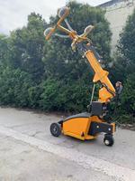Vente directe d'usine de robots de levage et d'installation de vitres isolantes de haute qualité, mobiles et faciles à installer.