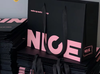 Haute tendance magasin de vêtements pour hommes et femmes sac à provisions en papier rose noir personnalisé sac à main sens avancé pour la promotion