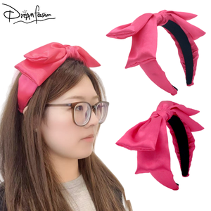 Bandeau de cheveux pour femme, accessoire de mode, nœud rose bonbon, design tendance, fait main, vente en gros - Product Image 1
