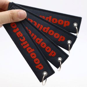 <b>Custom</b> Embroidered Streetwear Style Fabric <b>Keychain</b> for Clothing Brand Merchandise Personamlzed Woven logo Jet Tag <b>Keychain</b> - Product Image 1