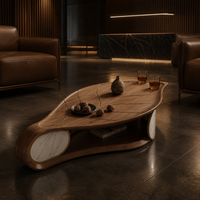 Table basse en noyer courbée de style minimaliste italien, table à cocktail de luxe en forme de feuille avec accent en marbre pour la maison et l'hôtel