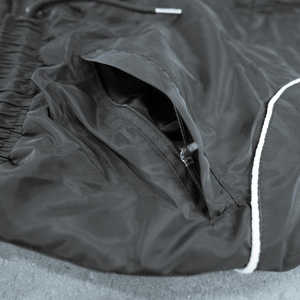Sport personalizzati di alta qualità in esecuzione oversize <span class=keywords><strong>paracadute</strong></span> larghi stampa <span class=keywords><strong>pantaloni</strong></span> pista riflettente giacca <span class=keywords><strong>a</strong></span> vento <span class=keywords><strong>pantaloni</strong></span> per gli uomini in Nylon - Product Image 4