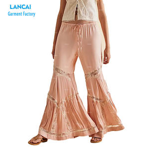 OEM Pantalon à jambes évasées à taille haute et à cordon de serrage pour femmes de haute qualité Pantalon à jambes évasées avec bordure en dentelle - Product Image 1