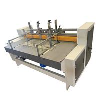 Machine automatique de découpe de carton ondulé pour la fabrication de cloisons et de panneaux de séparation de boîtes en carton