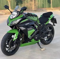 Moto sportive Kawasaki Ninja400 400cc d'occasion, refroidie par eau, essence, vitesse maximale >80 km/h, puissance 1001-2000W, idéale pour les débutants, parfaite