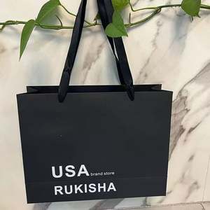 Bolsas de Mano de Alta Gama KM para Tiendas de Ropa, Bolsas de Compras Grandes Personalizadas para Mujer, Bolsas de Papel para Empaque - Product Image 1