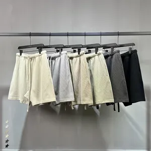 2024 primavera-estate pantaloncini Waffle traspiranti di fascia alta stile Casual pantaloncini larghi con coulisse taglio dritto pantaloni corti da uomo