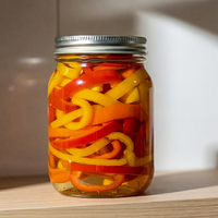 Poivrons en conserve en conserve de verre, tranchés, rouges et jaunes, acidifiés, saveur salée, durée de conservation de 2 ans
