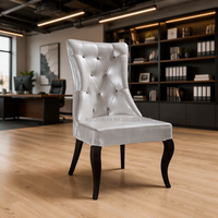 Chaises de salle à manger élégantes de style américain en cuir blanc rembourré avec structure métallique pour restaurants et hôtels QL8001