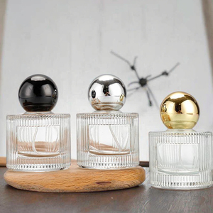 Botellas <span class=keywords><strong>de</strong></span> perfume <span class=keywords><strong>de</strong></span> vidrio redondas <span class=keywords><strong>de</strong></span> 30ml, 50ml, 100ml con <span class=keywords><strong>atomizador</strong></span> presurizado <span class=keywords><strong>de</strong></span> coche ámbar para Australia para limpiador facial - Product Image 1