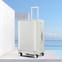 Valise PC légère à ouverture frontale, durable, avec cadre en aluminium, design moderne, roues pivotantes, serrure à combinaison, roulement fluide et souplesse.