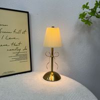Lampe de chevet LED rechargeable à commande tactile, style rétro, avec couvercle en tissu métallique, motif nœud romantique, design créatif inspiré des célébrités, pour chambre à coucher, pour l'export.