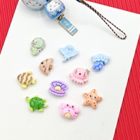 100 pièces en gros bricolage dessin animé mer animaux coquille étoile de mer Flatback Mini mignon résine poisson tortue Octpus décoration charme artisanat