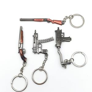 <span class=keywords><strong>Porte</strong></span>-clés en métal de simulation, pistolet de jeu de simulation en alliage de zinc, vente chaude - Product Image 1