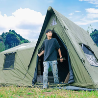 Tente de camping gonflable de couleur verte avec deux chambres