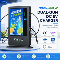 Chargeur DC double pistolet haute luminosité 65 pouces avec protection IP54 pour sites de recharge de véhicules électriques commerciaux en extérieur