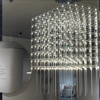 Grand lustre LED ANNO avec design étoilé multi-couches, luminaire suspendu en cascade personnalisé pour atrium à plafond haut