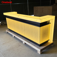 Table de bar à vin en pierre artificielle translucide avec éclairage LED RVB design luxueux, comptoir de bar à salades pour discothèque à vendre
