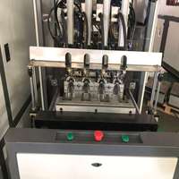 Équipement de soufflage de bouteilles en PET semi-automatique pour bouteilles d'une capacité de 100 ml à 2 L