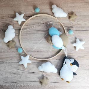 ของตกแต่งห้องเด็กอ่อนสไตล์นอร์ดิกใหม่ปี 2024 จาก Etsy ของเล่นดนตรีน่ารัก รูปดาว เพนกวิน ลูกโป่ง โมบายเด็กทำจากผ้าสักหลาด - Product Image 6