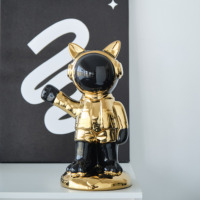 Nouvel arrivage de statue d'astronaute plaqué or noir décoration de bureau créative ornements en céramique