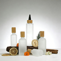 Bouteilles compressibles en verre dépoli personnalisées en gros avec bouchon en bambou, pots vides anti-fuite pour huile capillaire, sérum pour le cuir chevelu et produits de soin de la peau