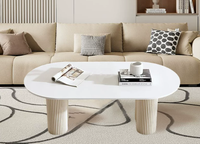 Table basse ovale de salon, couleur crème, haut de gamme, fabriquée au Guangdong, pour petit appartement, style français, nouveau style, usage domestique, blanche