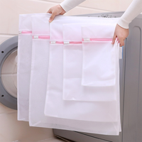 Vente en gros sacs à linge en filet pour machine à laver sac à vêtements en filet réutilisable avec étiquette
