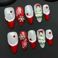 Prensa de Navidad en las uñas 10PCs Set Rojo Blanco Estilo francés Diseño de perlas Forma de ataúd de almendra larga Uñas postizas Colección al por mayor