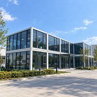 Bâtiment de bureau en conteneurs préfabriqués modernes avec mur-rideau en verre pour bureau de projet et usage commercial VICDOWEX