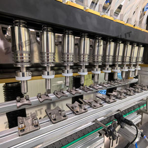 Botella de vidrio Seguimiento Vino Vinagre Agua mineral Líquido Máquina de llenado al vacío para Malta con transportador - Product Image 3