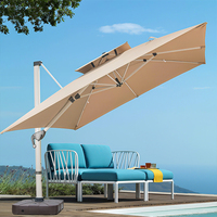 Parasol de terrasse moderne de 9 pieds à énergie solaire avec lumières LED et bouton d'inclinaison pour meubles d'extérieur, jardins, cours, hôtels, plages