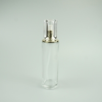 Atomiseur de parfum de luxe, corps en verre transparent, capuchon estampé or, capacités 30ml/50ml/100ml, flacons de soin de la peau de luxe