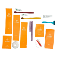 Set de Artículos de Aseo Desechables para Hotel en Bolsa de Plástico con Estampado Naranja, Logotipo de Marca Personalizado, Paquete Individual, Artículos de Aseo para Hostelería