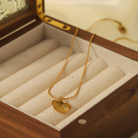 Nouveau collier de Style feuille de Ginkgo en acier inoxydable Type de personnalité Unique jupe Biloba pendentif élégant accessoire pour femme Non-fading