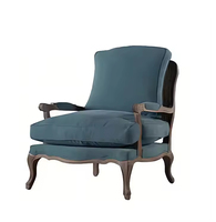 Fauteuil simple de style vintage, cadre en bois clair, coussin en tissu bleu, fauteuil de salon, durable