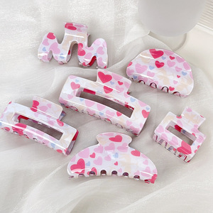 Pinces à cheveux créatives en forme de cœur coloré en plastique imprimé rose pour la Saint-Valentin, pinces à cheveux rhombiques de 10 cm - Product Image 1