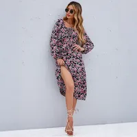 Robe vintage unie à manches bouffantes et dos nu pour femme en noir, disponible en tailles S à XL, vente en gros avec faible MOQ