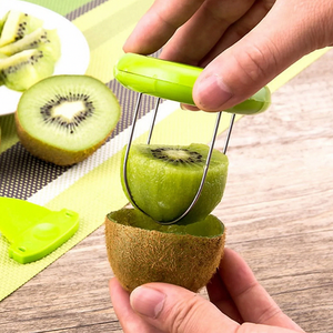 Taglia Kiwi <span class=keywords><strong>3</strong></span> <span class=keywords><strong>in</strong></span> <span class=keywords><strong>1</strong></span>: Sbucciatore, Affettatore e Utensile per Tagliare <span class=keywords><strong>in</strong></span> Plastica - Product Image 1