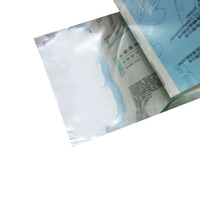 Film d'emballage alimentaire imprimé sur mesure, film plastique laminé flexible, film plastique automatique en rouleau, sachet en rouleau