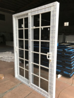 Porte coulissante PVC/UPVC haute sécurité avec grilles, surface finie, ouverture latérale, double vitrage en verre trempé pour balcon