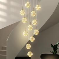 Lustre suspendu en verre LED de luxe nordique pour escalier et maison duplex, design minimaliste moderne de style long