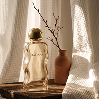 Vente en gros de flacons de parfum en verre transparent de 30, 50 et 100 ml avec vaporisateur haut de gamme, possibilité de personnalisation