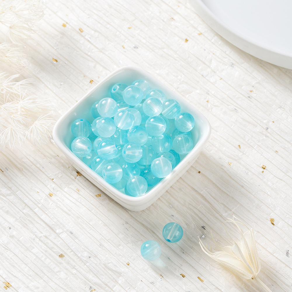Perles de verre bicolores - bleu clair et blanc