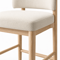 Tabouret de bar moderne rembourré crème avec dossier ouvert, structure en bois clair, repose-pieds, chaise haute pour îlot de cuisine et bar à domicile