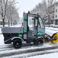 Vehículo para Nieve con Transmisión de Tracción en las Cuatro Ruedas, Diferenciales Dobles, Dirección Asistida Hidráulica y Tolva para Conducción en Terrenos Difíciles