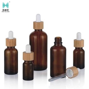 Ambre 5ml 10ml 15ml 20ml 30ml 50ml 100ml 200ml Huile Essentielle Botte en verre Cear <span class=keywords><strong>Bouteille</strong></span> en verre avec compte-gouttes en bambou - Product Image 1