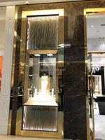 Vitrine d'angle murale en verre pour salon et magasin de détail, présentoir de rangement moderne de luxe pour centre commercial, en métal et MDF