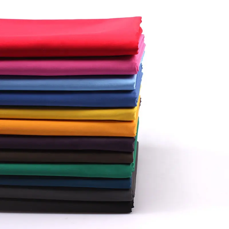 Manteau de pluie Offre Spéciale en polyester teint 228t, tissu taslan pour uniforme scolaire