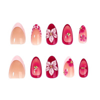 Ongles courts en acrylique rouge et rose nude, forme amande, à presser, avec motif floral 3D et perles étoiles dorées, style français, modèle BOX DESIGN